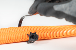 Fixing tie specificly developed for braided sleeving. Pins on the strap will fit into the braided sleeving to avoid movement.