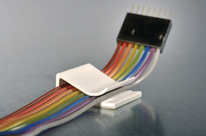 130100 self adhesive mount for flat cables.