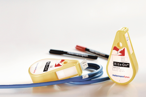 Ecriture et prise en main facile des étiquettes avec le dévidoir Rite-On.