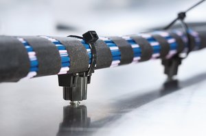 Versatile design allows cable routing above, perpendicular or parallel to stud.