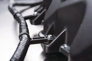 Offset design positions bundles away from obstructions, heat or sources of abrasion.