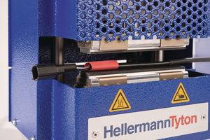 Place the shrink object between the shrink pads.