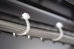 Heavy duty T-Series cable ties feature inside serrations to provide a positive hold on wire and cable bundles.